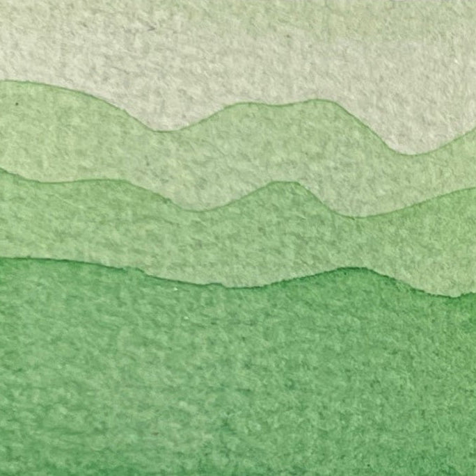 Gradient of Lime green watercolor shades on a textured watercolor paper