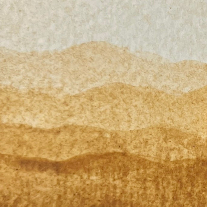 Gradient Swatch of Light Yellow Ochre watercolor shades on a textured watercolor paper
